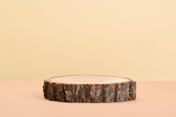 A scene with a showcase made of natural wood on a beige background.