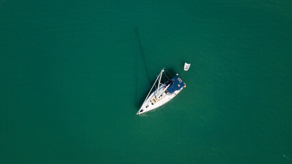 Aerial view of a sailboat in Paraty Bay, Rio de Janeiro, Brazil