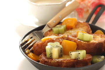 Homemade kiwi fruit and mango French toast for cafe food image