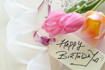 hand written HAPPY BIRTHDAY message card with flower 