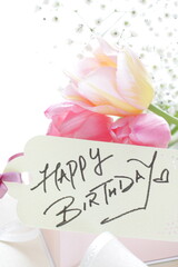 Obraz premium hand written HAPPY BIRTHDAY message card with flower 