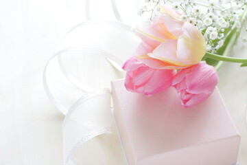 pink gift box and ribbon with turnip flower 