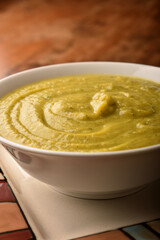 Vegetables soup in  a wood table