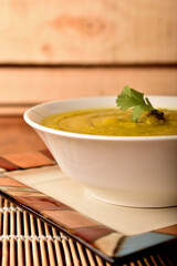 Vegetables soup in  a wood table