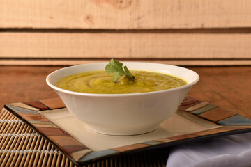 Vegetables soup in  a wood table
