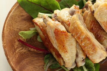 Chinese food, homemade grilled chicken on baby leaves for comfort food