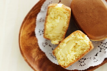 Japanese street food, cheese filling confectionery on wooden plate