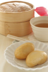 Chinese food, deep fried meat and sticky rice ball for Yum cha dim sum on white dish
