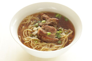 Chinese food, braised pork belly and egg noodles in soup for homemade comfort food