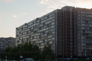 Fototapeta premium A building in the city. Urban development. Multi-storey house.