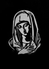 a marble engraving representing the Virgin Mary in the Orthodox cemetery in Reghin city - Romania