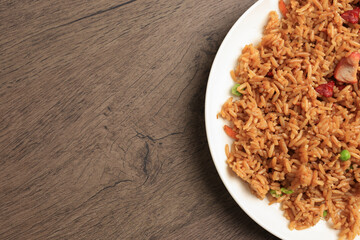 Closeup combination fried rice with space for text. Top shot of plate of food on table