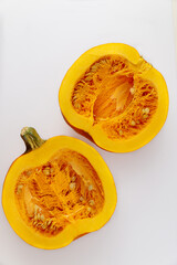 Fresh cut pumpkin isolated on white background.