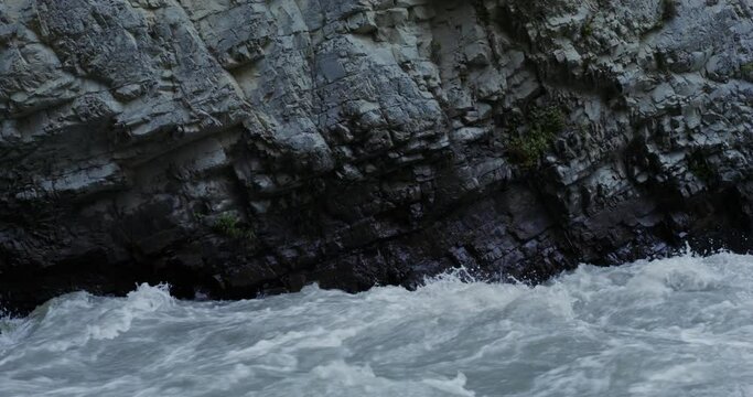 Mountain river, seething with strong stream among the rocks