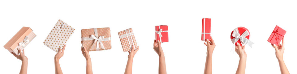 Female hands with gift boxes on white background