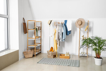 Interior of room with stylish clothes
