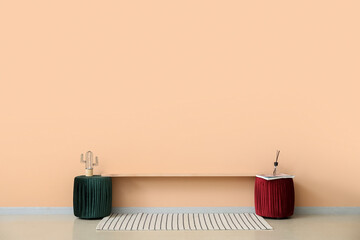 Creative TV stand with decor near color wall