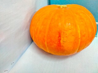 pumpkin on a wooden table