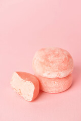 Tasty Japanese mochi on color background