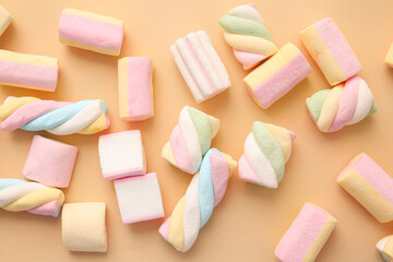 Tasty marshmallows on color background