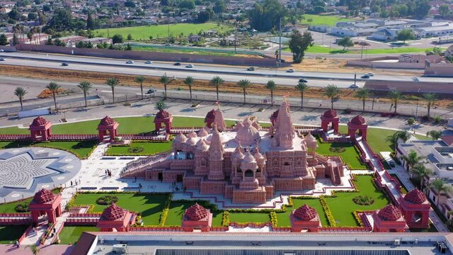 Panning left view of a Hindu temple near Los Angeles California