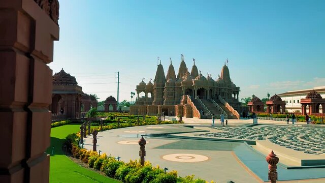 Panning right shot of the left side of a Hindu temple in Chino California