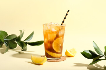 Glass of tasty Long Island iced tea on color background