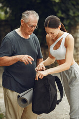 Old man with his granddaughter