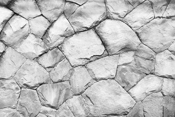 Rock decorative on concrete wall with seamless patterns grey background