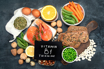 Food high in vitamin B1 on dark background.