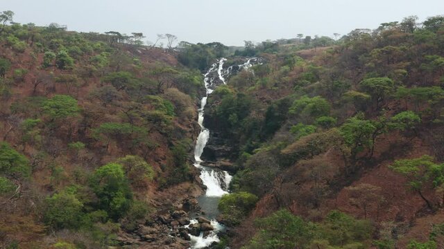 Flying over a waterfall in Bié , Angola on the African continent 12
