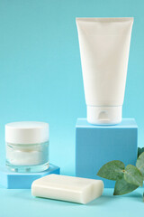 Cosmetic skincare container blank mockups in styled setting.