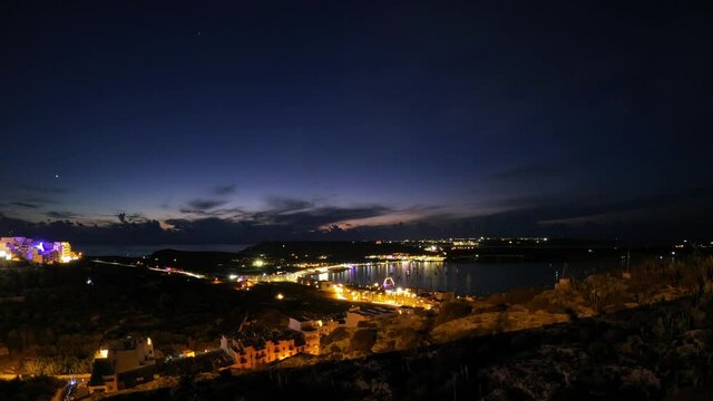 Timelapse video from Malta, Mellieha Heights location showing the popular bay from sunset to evening.