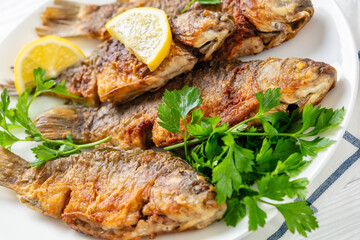 fried crucian carps with golden crispy crust
