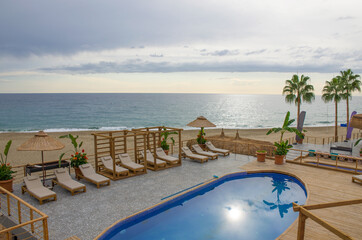 The recreation area near water in the summer
