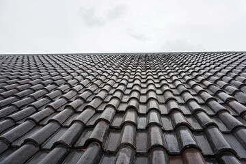 Black roof of the house tile arrangement