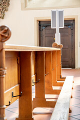 Church pew with knee support