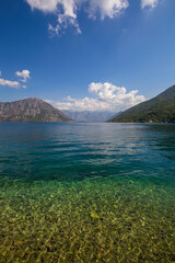 Wonderful view of the sea, mountains and blue sky in the Boka Kotorska Bay near the city of Kotor, Montenegro