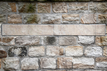 Writing field in a wall of stone