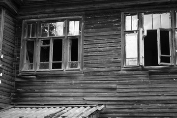 old wooden building in black and white