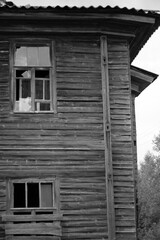 old wooden building in black and white