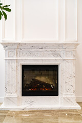 white fireplace in a classic interior for home or hotel.