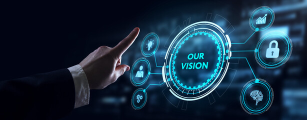 Business, Technology, Internet and network concept. Young businessman working on a virtual screen of the future and sees the inscription: Our vision © putilov_denis