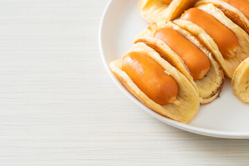 flat pancake roll with sausage