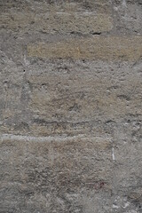 Old dirty wall close up. Grunge abstract photo background.  Beautiful stone texture pattern. Good for post-processing and design
