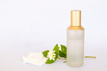 the therapy first serum toners with cotton natural cosmetics extract herbal health care for skin face beauty of woman with flowers arrangement flat lay style on background white