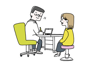 医者に話を聞いてもらっている女性