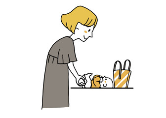 外出先で赤ちゃんのオムツを変えている女性