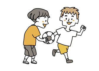 サッカーをしている二人の男の子