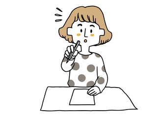 テストで答えを思いついた女の子